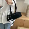 Bolso para la axila de diseño simple y nicho Nuevo bolso de mujer Verano 2025 Bolso de hombro versátil informal Bolso cruzado