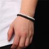 Pulsera unisex sencilla de alta gama para viajeros, con cuentas de piedra calientes de 6 mm transfronterizas de Europa y Estados Unidos, cuerda elástica para hombre y mujer que combina con todo.