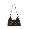 Bolso de axila de alta gama, nicho, estilo vintage para mujer, nuevo bolso tote 2026, gran capacidad, versátil para ir al trabajo y se puede llevar como bolso cruzado.