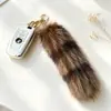 Chaveiro de Pelúcia de Cauda de Guaxinim Falsa para Mulheres Chaveiro de Carro Pingente de Pele Decoração Spicy Girl Acessórios de Bolsa Guaxinim de Água