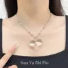Collar con colgante de corazón transparente cruzado dulce y fresco estilo coreano para mujer, diseño de nicho, cadena versátil para suéter, accesorio choker