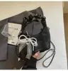 Bolso de Mano de Nicho Estilo Coreano Transfronterizo Bolso Dumpling para Mujer Otoño 2026 Nuevo Plegado Casual Versátil Bolso de Hombro Cruzado
