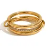 Moda Europea y Americana Nicho Elegante Creativo Personalizado Joyería de Mano Acero Inoxidable Chapado en Oro de 18K Anillo de Diamante Central de Cuatro Capas para Mujer
