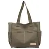 Bolsa de Lona Estética de Alto Valor para Mulheres, Grande Capacidade, Bolsa de Ombro para Estudantes, Bolsa de Mão Portátil, Novo Estilo Tendência Primavera/Verão 2026