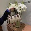 Bolso de Mano Mini Boston Estampado de Leopardo con Lunares Estilo Otoño 2026 para Mujer Retro Gamuza Pequeño Cruzado Cilindro Redondo Bolsa Pequeña