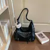 Nova bolsa de mão outono de 2026, bolsa de ombro moderna de grande capacidade, bolsa transversal de cor sólida de alto valor, bolsa tote para motocicleta