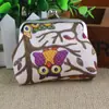 Bolsa de monedas pequeña linda coreana para mujer, lona, búho de dibujos animados, bolsa de monedas para niños, billetera pequeña Yiwu al por mayor