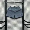 Shorts Esportivos Populares Fitness Respirável Secagem Rápida Masculino e Feminino Soltos para Corrida Shorts de Três Pontos Falso Duas Peças Anti-Exposição