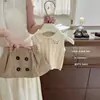 Conjunto de Duas Peças Xian Ning QiGirl: Suéter de Tricô Gola Polo Estilo Preppy Coreano e Saia Curta Cáqui