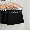 Saia Elegante de Lã Preta Versátil 2025 para Mulheres no Outono e Inverno Sexy de Cintura Alta Justa Versátil em Linha A