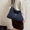 Bolso de mano versátil casual estilo coreano para mujer, gran capacidad, estilo artístico, de un solo hombro, bajo el brazo, lona con estampado floral 2026