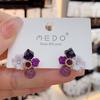 Pendientes de flor pequeña de cristal morado, diseño de nicho femenino, elegantes pendientes de celebridades de Internet, nuevos pendientes de aguja de plata de moda 2023