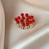 Novo broche estilo antigo de alta qualidade ins para mulheres estilo chinês leque borla pino de terno placket de pressão cheongsam corsage atacado