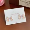 Aretes de Corazón Azul Manchado para Mujer, Pines de Plata, Dulces de Verano, Ligeros, Lujosos, de Gama Alta, Elegantes, Aretes de Corazón de Niña con Lazo