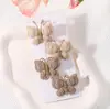 Traje de Pasador de Pelo Tejido a Mano de Lana Europeo y Americano Mariposa Enrollada Pasador de Color Sólido Suave Todo-partido Tocado para Bebé 3841