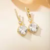 Pendientes de nicho de lujo ligero superventas transfronterizo "Corazón del Océano", cobre cuadrado incrustado con circonita, pendientes de alta gama para mujer, venta al por mayor