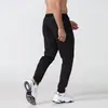 Novas Calças Esportivas Masculinas de Caimento Solto para Primavera/Verão, Corrida ao Ar Livre e Fitness, Tamanho Grande Malha Calças Esportivas Casuais