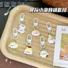 Chaveiro fofo de desenho animado de foca adorável, bolinho de pudim, charme feminino para mochilas de estudantes, presente para melhores amigos