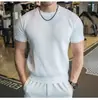 Estilo nuevo de verano moda de Hong Kong moderna holgada diseño de nicho versátil camiseta para hombre adecuada para el uso diario en 2026