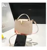 2025 Nuevo Patrón de Piedra Portátil Accesible Lujo Moda Hombro Único Retro Elegante Cruzado de Cuerpo Tendencia Bolso Cubo Pequeño para Mujer