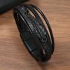 Pulsera europea y americana de aleación de zinc pluma negra en stock Amazon comercio exterior Pulsera de cuero tejido multicapa para hombre con hebilla magnética