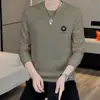 Sudadera de cuello redondo para hombre 2026 Nueva Camiseta de manga larga de jacquard Moda moderna Casual Versátil Talla grande Camisa base