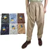 Calça Masculina de Poliéster Wide Leg com Bolsos Estilo Cross-Border, Roupa Masculina de Corte Amplo Atacado em Estoque