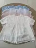 Verano 2026 Nueva Camisa Suelta de Lino Estilo Japonés con Cuello Redondo para Mujer con Encaje Dulce, Estilo Ins para Comercio Exterior