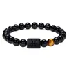 Pulsera del Zodiaco Piscis con Cuentas de Ónice Negro y una Sola Cuenta de Ojo de Tigre Presentando un Símbolo Único de Piscis Perfecta para Uso Personal o como un Regalo Considerado para Entusiastas del Zodiaco