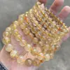 Jingde Jewelry Pulsera de Cristal de Oro Cabello Shun Natural 7A para Hombres y Mujeres Pulsera de Cuentas Redondas de Cristal de Titanio Dorado Venta al por Mayor de Joyería