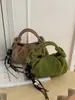 Exquisito bolso retro de gamuza de nicho para mujer, nuevo modelo 2026, bolso cruzado casual versátil, bolso de mano pequeño súper popular