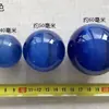 Venta al por mayor de fábrica de adornos coloridos de ojo de gato, adornos para sala de estar, juego de balonmano, piedra de ojo de gato, bola de cristal, bola de Feng Shui