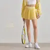 Falda de Yoga Elástica de Cintura Alta Adelgazante Aidu con Forro para Prevenir la Exposición, Falda de Tenis con Bolsillo, Falda Plisada Casual para Exteriores
