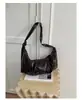 Bolso de hombro plisado de diseño de nicho 2026 para el día a día, nuevo y elegante bolso cruzado, bolso tipo dumpling de PU de color sólido de alta gama, moderno