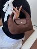 Bolso Pequeño Retro de Gamuza para Llevar en la Mano para Mujeres 2026 Nuevo Bolso de Hombro Cruzado de Moda Bolso Nube para Viajar Trendy