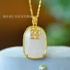 Colgante de jade de seda dorada de Xinjiang con incrustaciones de jade blanco de la marca Ping An, colgante de jade Dongling con incrustaciones de oro, colgante de la marca sin incidentes, suministro en vivo