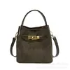 Bolso tipo cubo liso, simple y casual, bolso de hombro para mujer, nuevo estilo 2026, adecuado para el trabajo y los desplazamientos, un bolso cruzado moderno y elegante