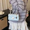 Bolsa Popular de Ombro Único para Axila Estilo Coreano 2026 Novo Modelo Bolsa de Corrente Acolchoada Estilo Chanel para Mulheres Bolsa Transversal Quadrada Pequena de Couro Encerado