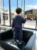 Conjunto de Otoño para Niños 2026 Nuevo de Moda Estilo Urbano Conjunto de Dos Piezas de Camisa Polo Infantil para Primavera y Otoño Ropa para Niños Estilo Coreano