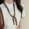 Collar Magnético de Perlas con Estampado de Leopardo Rosa para Mujer 2025 Nuevo Diseño de Nicho Cadena para Suéter Lujo Accesible Accesorios de Gama Alta
