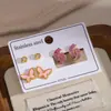 Pendientes de Tachuela de Trébol de Cuatro Hojas de Acero Inoxidable Rojo Dorado Más Vendidos Set de Tres Piezas para Mujer Redondo Incrustado de Diamante Joyería para Orejas Pequeña de Nicho con Acabado de Alta Gama