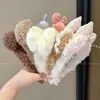 Diadema divertida estilo coreano de dibujos animados para mujer, con diseño de peluche, perfecta para usar al aplicar mascarillas faciales o lavarse la cara, y también adecuada para crear un peinado de coleta alta.