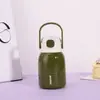 Nueva taza térmica elegante de acero inoxidable con alto valor estético, portátil y conveniente, compacta y simple, con un ambiente juvenil