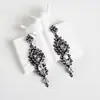 Pendientes Amazon transfronterizos, extragrandes, electrochapados, elegantes, de estilo largo, con un toque de alta gama, adornados con borlas y pedrería negra