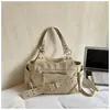 Bolsa Retro Texturizada de Alta Qualidade para Mulheres 2025 Nova Moda de Inverno Bolsa de Ombro Transversal Versátil Bolsa Tote para o Dia a Dia Tendência