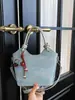 2026 Nuevo Bolso de Mano Estilo Coreano de Comercio Exterior Transfronterizo Bolso de Hombro de Moda Bolso Cubo Simple Elegante para Mujer Bolso Cruzado