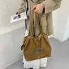 Bolso Tote de Ante con Letras Estilo Coreano para Mujer 2026 Nuevo Gran Capacidad para Viajes Diarios Bolso de Hombro con Cordón Bolso de Mano