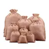 Bolsa de regalo navideña con cordón para guardar joyas, ideal para eventos transfronterizos.