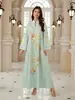 NT06 Superventas transfronterizo: Elegante vestido largo de malla jacquard estampado, nuevo modelo de Malasia