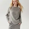 2026 Estilo Minimalista Otoño/Invierno Nueva Ropa de Punto de Cachemir para Bebé para Mujer Cuello Redondo Borde Enrollado Mangas Raglán Suéter de Estilo Relajado